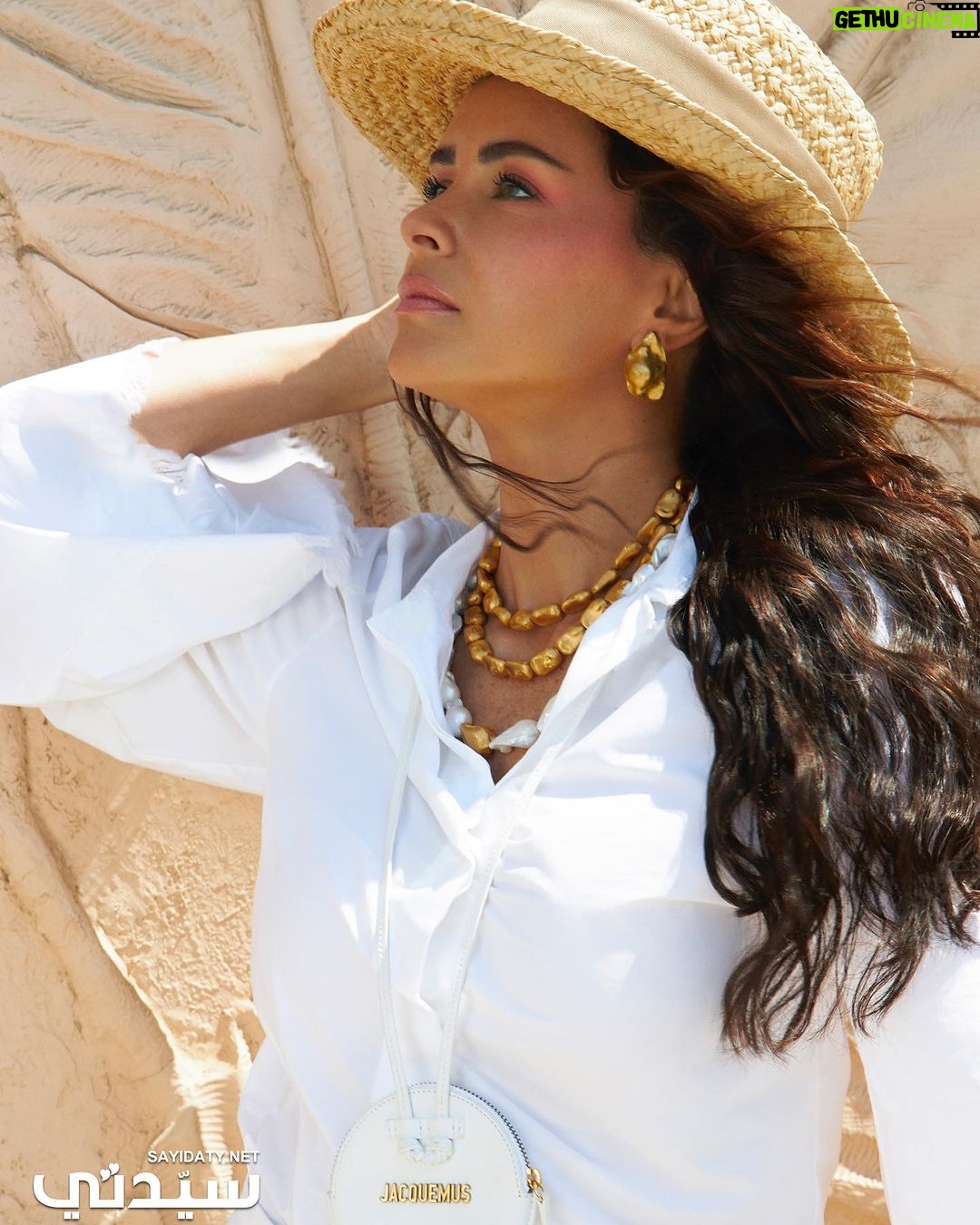 Nour Instagram - Turn your head to the sun and feel its blessings ☀️ Photographer: @bilohussein Stylist: @yasminekenawi Outfit: @calcaterrad @jtbyjt @villababoushka Jewelry: @nadosjewellery BAG: @jacquemus Makeup: @zeinabhassan_ Hair: @mahmoud_hair_stylist
