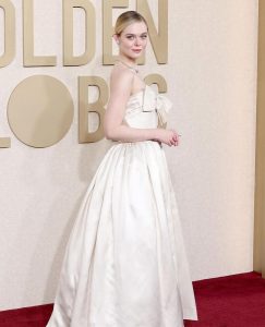 Olivier Rousteing Instagram - L’élégance Balmain at the Golden Globes 🤍 @ellefanning styled by @samanthamcmillen_stylist Pierre Balmain gown from 1960 The French legacy , so proud of showing the incredible craft and savoir faire from The Balmain House .