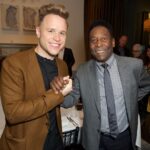 Olly Murs Instagram - I’ll never forget having dinner with Pele in 2016! Was a honour to be in his presence, we sat and listened to all his incredible stories for a few hours! Then weeks later share this moment with him on the pitch is something I’ll never forget! A legend forever, the greatest x RIP PELE 🇧🇷👑🙏🏻