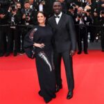 Omar Sy Instagram - Repost from @prada • @omarsyofficial and @mynameishelenesy wore #Prada while attending "Top Gun: Maverick" premiere during the 75th Cannes Film Festival at Palais des Festivals (@festivaldecannes). Make-up @anglomamakeup Styles by @colinebach #PradaPeople #Cannes2022