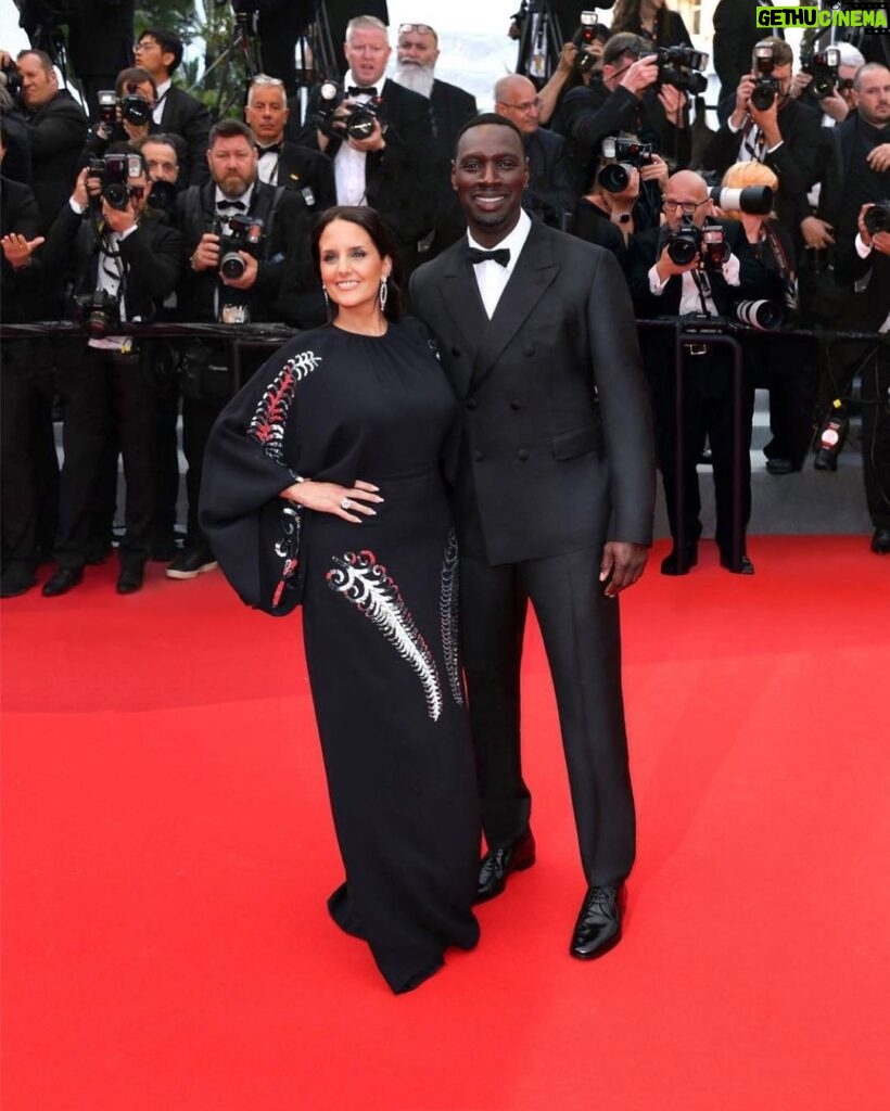 Omar Sy Instagram - Repost from @prada • @omarsyofficial and @mynameishelenesy wore #Prada while attending "Top Gun: Maverick" premiere during the 75th Cannes Film Festival at Palais des Festivals (@festivaldecannes). Make-up @anglomamakeup Styles by @colinebach #PradaPeople #Cannes2022