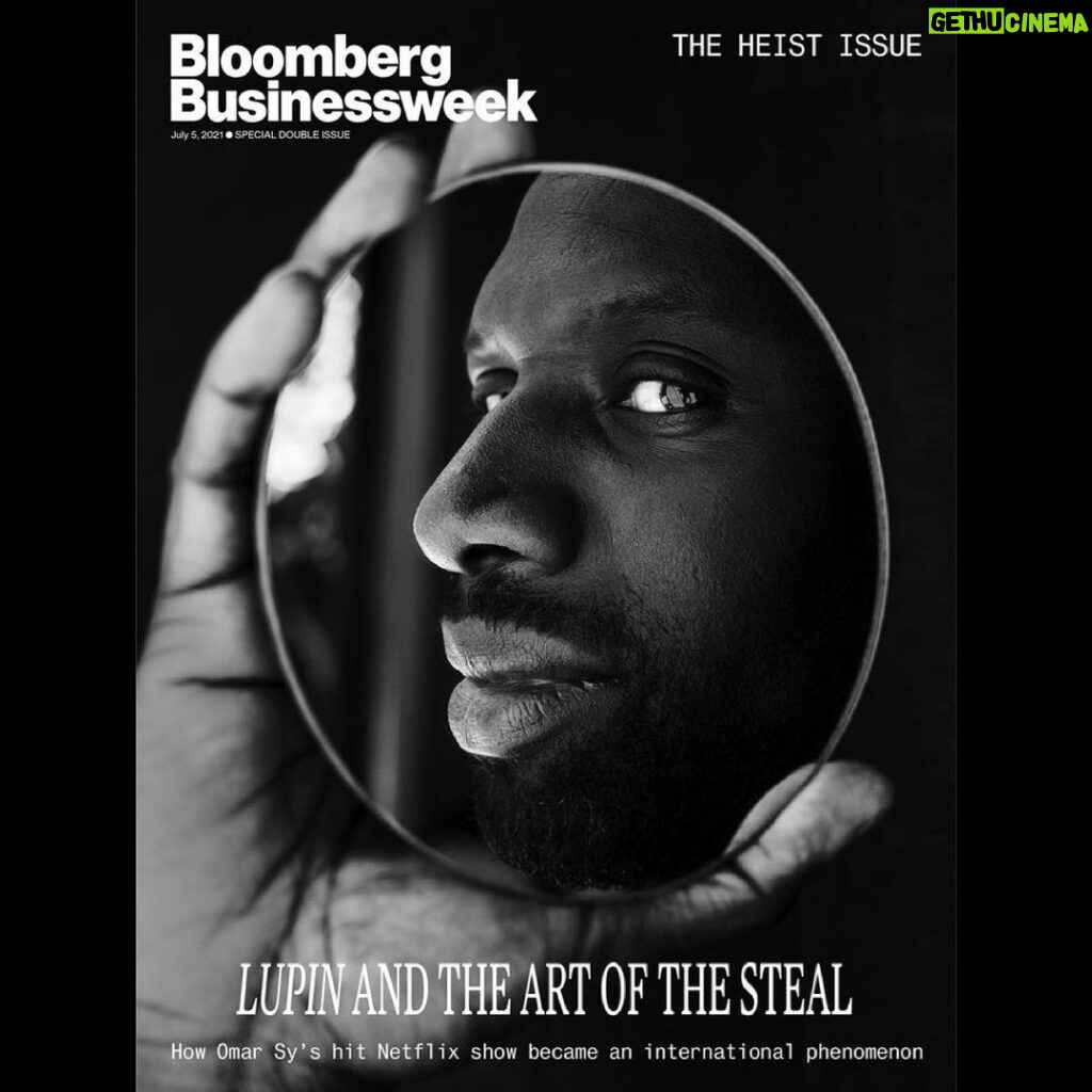 Omar Sy Instagram - Repost from @businessweek • ● NEW COVER: Our annual heist issue, featuring Lupin and the art of the steal. This is how Omar Sy's hit Netflix show became an international phenomenon.⁣ ⁣ ● Lupin, which premiered in January, was watched by 76 million households in its first four weeks, making it the second-most-successful debut ever for an original Netflix show, after only Bridgerton. Following a global publicity campaign, it returned on June 11 with five new episodes in which Assane Diop uses everything from wardrobe changes to martial arts mastery to elude his adversaries as they close in on him. The reviews of Lupin Part 2 have been laudatory, even if critics caution viewers not to overthink the show, and a third installment is on the way.⁣ ⁣ ● Like many heist films and shows, Lupin frequently requires a willful suspension of disbelief—and then some. But just as Sy’s character constantly diverts people’s attention from his larcenous doings with his ploys, the audience is beguiled by the chic Parisian sets, haute production, and riveting orchestral soundtrack. Then there’s Sy, whose presence makes even the most incroyable moments worth watching. “His smile lets him—how do you say it in English?—get away with murder,” says Ludovic Bernard, who directed two new Lupin episodes.⁣ ⁣ ● Lupin arrived just in time for Netflix. Last year, as the pandemic settled over the world, it added a remarkable 37 million new subscribers, bringing its total to 204 million. But in April the company revealed it had added only 4 million more in the first quarter of 2021, 2 million shy of its own projections. Netflix shares tumbled 11% in after-hours trading that day. Still, the company had something it could use to divert investors’ attention: a hit show from, of all places, France.⁣ ⁣ ● Photographer: @djeneba.aduayom⁣ ⁣ ● Grooming: @barbaraguillaume / Forward Artists Los Angeles, California