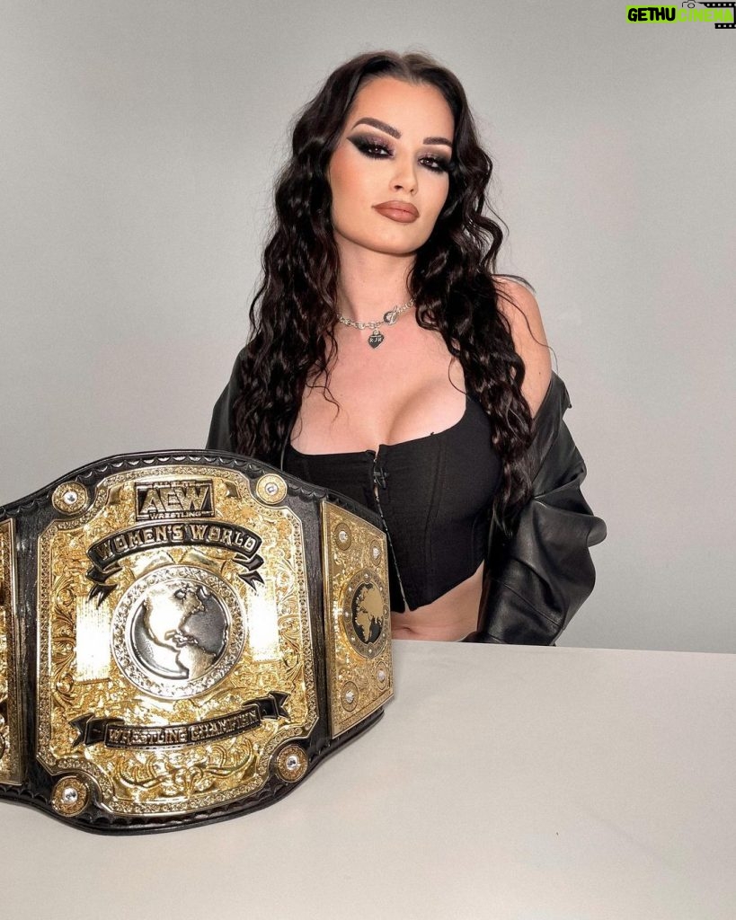 Paige Instagram - Happy 1 year anniversary to me being in @aew last year I walked into Arthur Ashe having no idea I could wrestle to now I’m walking in as your champion. Swipe to see me very incognito sneaking in 1 year ago 😂