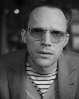 Paul Bettany Instagram - @robotproof took this photo one hundred years ago. I look very concerned but I was actually just trying to read the lens speed on his camera.