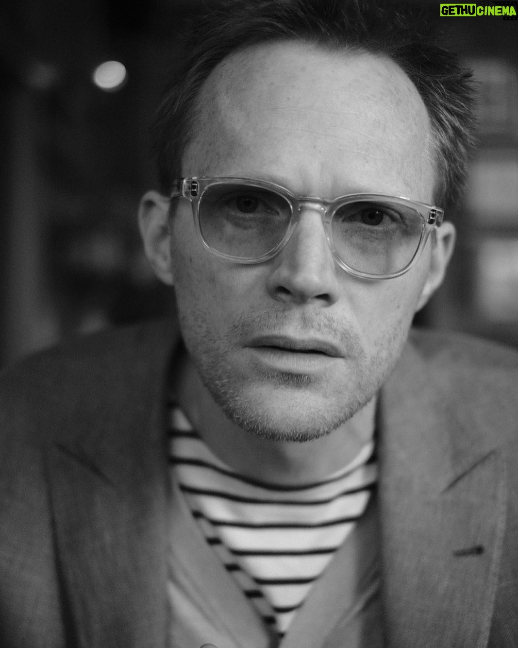 Paul Bettany - 116.4K Likes - @robotproof took this photo one hundred years ago. I look very concerned but I was actually just trying to read the lens speed on his camera.