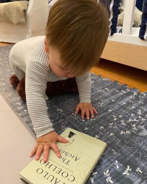 Paulo Coelho Instagram - Archer, the son of John and @shannon , receiving the first signed English copy of The Archer!