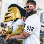 Pauly D. Instagram - GYM. TAN. BOUNCE. IOA Plaza Tailgate