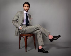 Penn Badgley Instagram - A beautiful Dormeuil wool #bespokesuit made by my friend Craig @robinsonbrooklyn whose shop I used to live above. Why now, of all times, to post something like this? Bc Craig asked me to. Sup Craig. ALSO consider everything we do before & after we vote is a decision to spend time, energy or money. I know exactly where it’s going with @robinsonbrooklyn and his is a small business I want to support. Thanks again, Craig! #pinksocks