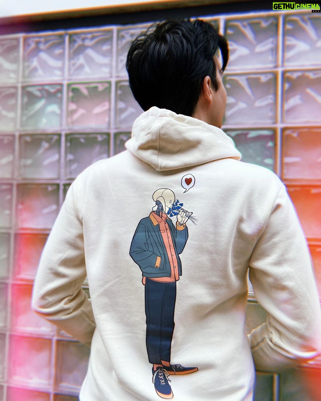 Phil Lester Instagram - ✨🍃Imagine a peaceful future without humans, just a cyber-Phil vibing with the flowers in Spring 2121 🤖🌷 A new limited merch collab with one of my favourite artists @deathandmilk_ !! Off-white soft hoodie in a double sided futuristic floral print - only available until the end of May Worldwide: amazingphilshop.com USA: us.amazingphilshop.com