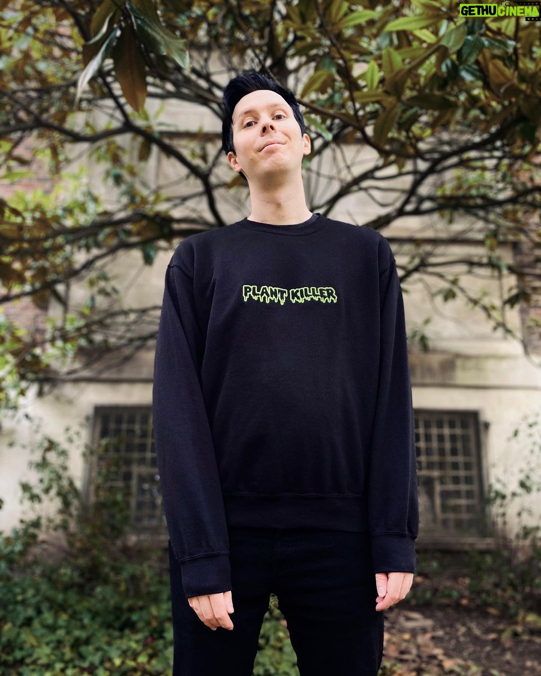 Phil Lester Instagram - Iโve made some spooky Autumn merch! ๐ป๐๐ฏ๐ฎ ft. Tarot long sleeve, scented candle, plant killer sweater and a pumpkin spiced hot chocolate! Get cosy over at amazingphilshop.com // USA us.amazingphilshop.com