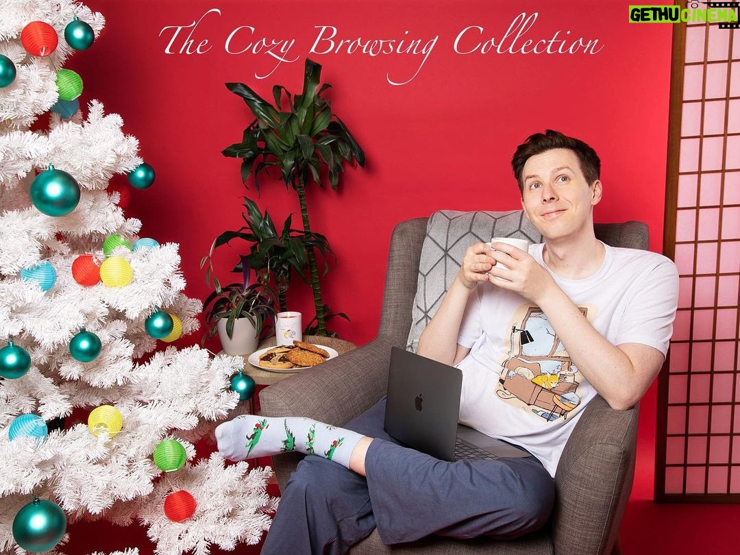 Phil Lester Instagram - The Dan and Phil shops have combined for the festive season and Iβm excited to share with you my cozy browsing collection! Featuring comfy pyjamas in collab with @cyarine, a festive candle, my very own hot chocolate blend and some slightly odd dinosaur socks! ππ―π€βοΈ Use code BLACKFRIDAY for 10% off! danandphilshop.com