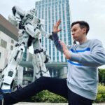 Phil Lester Instagram - I am actually 64ft tall and trained to take down a mecha if I really have to. Unicorn Gundam Statue