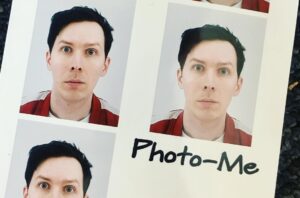Phil Lester Instagram - ‪My new forehead is officially in my passport! If emo hair comes back in style next year I will be mad ‬