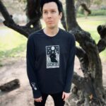 Phil Lester Instagram - I’ve made some spooky Autumn merch! 👻🍂🕯🔮 ft. Tarot long sleeve, scented candle, plant killer sweater and a pumpkin spiced hot chocolate! Get cosy over at amazingphilshop.com // USA us.amazingphilshop.com