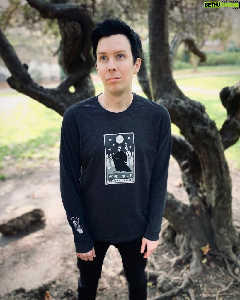 Phil Lester Instagram - I’ve made some spooky Autumn merch! 👻🍂🕯🔮 ft. Tarot long sleeve, scented candle, plant killer sweater and a pumpkin spiced hot chocolate! Get cosy over at amazingphilshop.com // USA us.amazingphilshop.com