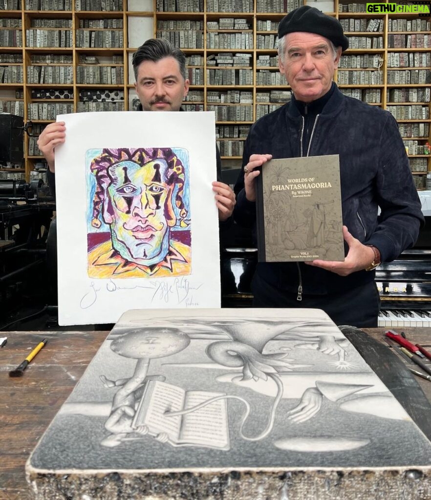 Pierce Brosnan Instagram - I recently had the great pleasure of watching Vladimir Manzhos WAONE from Kyiv, Ukraine create beautiful art work at @idemparis. We worked across from each other for two days and then he gave me his book. I gave him a lithograph of the Jester. © Pierce Brosnan #piercebrosnanart