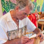Pierce Brosnan Instagram - Making lino cut at my friend @michalarts_com studio. Michal’s art work and fabrics radiate the beauty of Kauai. © Pierce Brosnan #piercebrosnanart