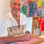 Pierce Brosnan Instagram - Making lino cut at my friend @michalarts_com studio. Michal’s art work and fabrics radiate the beauty of Kauai. © Pierce Brosnan #piercebrosnanart