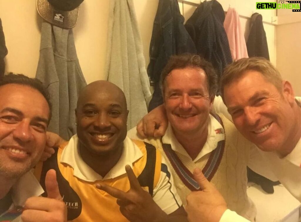 Piers Morgan Instagram - This just popped up in my Facebook memories and brought a lump to my throat… 8yrs ago today, the great Shane Warne helped me finally beat @newick_cc in my annual match against the village, aided by @tinolabertram & @adamhollioake - and this pic was the jubilant dressing room scene afterwards. We partied long into the night. We all miss you Warnie! Newick