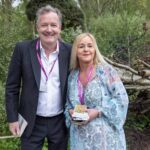 Piers Morgan Instagram – Such a treat being able to take my parents to the Chelsea Flower Show, especially in such glorious weather. The gardens were superb, many congrats to all the exhibitors and to all supported charities. Thanks also to @thenewtinsomerset for wonderful hospitality – much appreciated. 
PS The first pic of me and my Mum and Dad is by the great @richardyounggallery – one of the world’s best and most legendary photographers. Go check out his gallery. RHS Chelsea Flower Show, Royal Hospital Grounds, Chelsea