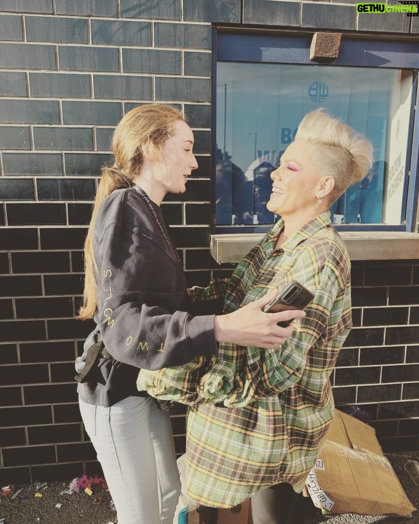 Pink Instagram - NIGHT TWO. BOLTON. That first video proves I’m just like a NASCAR in a pit stop before So What. The rest is just pure bliss. And there is Ellie in these photos. The brave person that wrote me that beautifully honest, vulnerable and heartbreaking letter that I read in my documentary, All I Know So Far. Ellie, I am so happy I got to hug you be with you and meet your sister Jenny, and your friends. You are so brave and so wonderful, and so alive. I am so proud to share this moment with you celebrating your strength and resilience. Let’s keep swimming. There may have been 80,000 people plus us- but I felt like i was in a big family room spending time together laughing and crying and dancing. Thank you from the bottom of my heart. My cheeks are tired from smiling. Until next time. #grateful #wehavefun #love #pain #lettinggo #summercarnivaltour