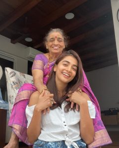 Pooja Hegde Instagram - Ajji’s love language was food. She was a great cook.She would feed anybody who walked through her doors even if it meant less for herself. She LOVED to dress up.Ajji would wear her saree & jewellery..then powder her face and yesterday’s bindi would be extracted from the mirror and onto her face.. she would then carry on to do house chores looking her best. She never complained about aches and pains. And inspite of all the issues she had, she always managed to keep a smile on her face..Always jolly, funny and sometimes she could roast you with just her honesty. The 1 thing she couldn’t resist, was desserts and fish, a trait I proudly inherited. “Ajji na Pulli”. That’s how I will remember you Ajji. You raised strong women. Thank you for all that you did. Love you ❤️ 🥺