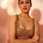 Pragya Jaiswal Instagram - Golden glow 🍯✨ Outfit @nadinemerabi Jewellery @blingthingstore Styled By @anshikaav Team @roshiijain @bhatia_tanisha Makeup @athirathakkar Hair @thakuramit190 Shot by @kaasastudio