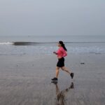 Priya Bapat Instagram – Running into the new year with a splash of positivity – because every step counts! 🌟 #BeachRunGoals #hello2024