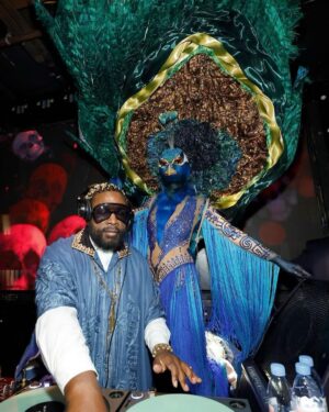 Questlove Instagram - Sun Ra & Annie Lennox (@lauraxdesiree) receive a peacock’s invite to a Halloween party 

Thanks Heidi Klum

Photographed by @christian_germoso
Styling @kahlihaslam 
Hair @elliott_brian

Cape @bode
Shirt, Custom Shoes, Accessories @l_enchanteur 
Pant @anicetestyle
Style assist @jovrnee