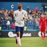 Raheem Sterling Instagram - Ten years ago on this very day, I made my debut for @england; something I’d dreamed about since I was a boy staring up at those Wembley arches from my back garden. Every muddy Sunday League match and gruelling training exercise led me to that moment, where I could stand up and proudly represent the Three Lions. Now here I am, ten years later, wearing number 10, heading into my third World Cup with the next generation of legends, and now it’s me holding the most caps...🤯 reality really can be crazier than dreams. The thing that stands out the most is our twelfth man: the fans. By our side with the energy and voice to lift us through every moment and power us up for every duel. I cannot wait to hit that stage again in an @england shirt 🏴󠁧󠁢󠁥󠁮󠁧󠁿🦁🦁🦁 Thank you everyone. Let’s go!!!!!!!