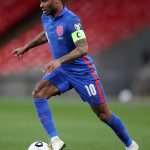 Raheem Sterling Instagram - Ten years ago on this very day, I made my debut for @england; something I’d dreamed about since I was a boy staring up at those Wembley arches from my back garden. Every muddy Sunday League match and gruelling training exercise led me to that moment, where I could stand up and proudly represent the Three Lions. Now here I am, ten years later, wearing number 10, heading into my third World Cup with the next generation of legends, and now it’s me holding the most caps...🤯 reality really can be crazier than dreams. The thing that stands out the most is our twelfth man: the fans. By our side with the energy and voice to lift us through every moment and power us up for every duel. I cannot wait to hit that stage again in an @england shirt 🏴󠁧󠁢󠁥󠁮󠁧󠁿🦁🦁🦁 Thank you everyone. Let’s go!!!!!!!