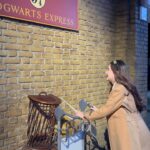 Ramida Jiranorraphat Instagram - Me, my wand and my Valentino🪄 #VALENTINOGAVARANI #locòbag Warner Brothers Harry Potter Studio Tour