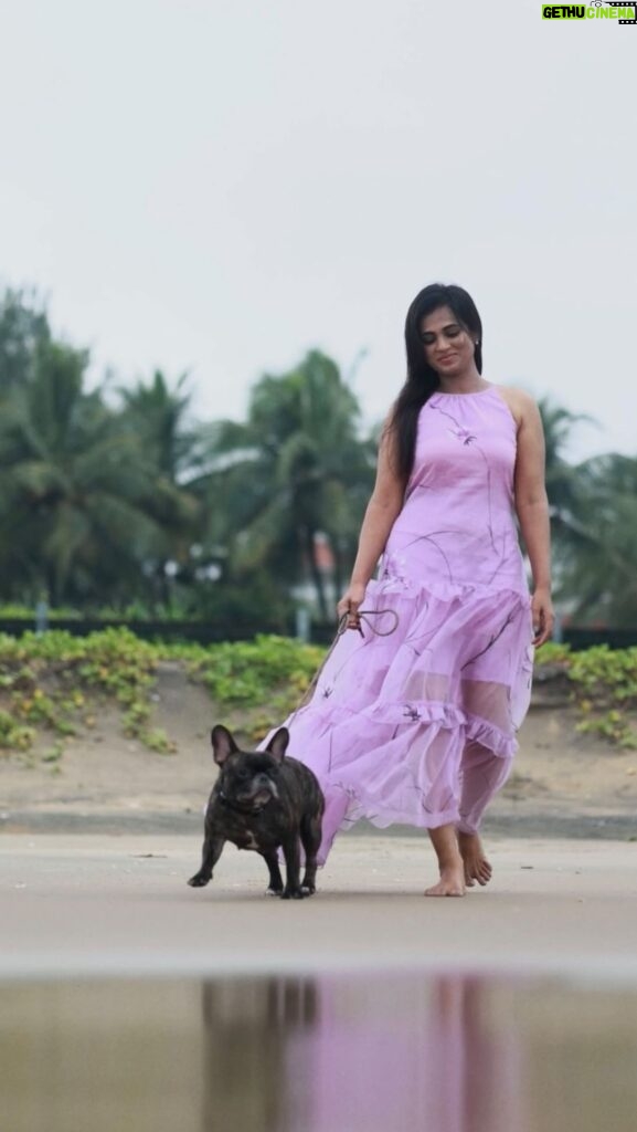 Ramya Pandian Instagram - In the silent language of love, my puppy and I share a story that words can’t capture. 🐾💫 Beautifully shot and edited by @sanjaysooriya #ramyapandian #puppylove
