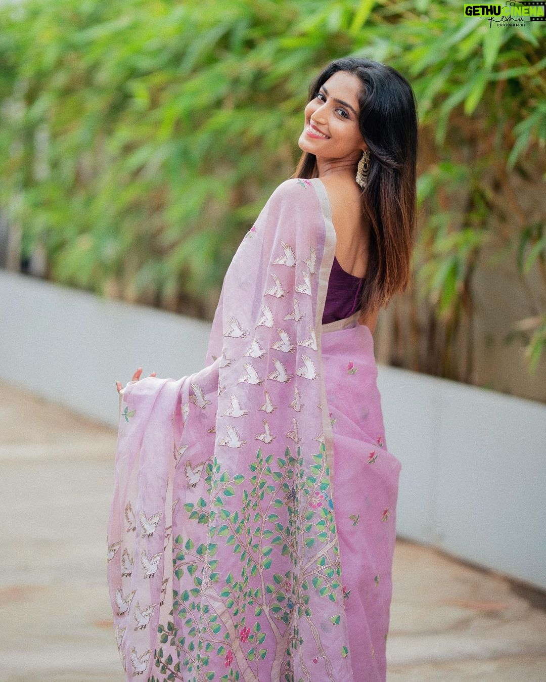 Reba Monica John Instagram - Draped in pink floral magic for SAMAJAVARAGAMANA promotions π Releasing on the 29th June guys! β¨ Styled by @officialanahita Saree: @theantoraofficial Pics: @they_call_me_keshu Hair: @prakash_kasara MU: yours truly #sixyardsofelegance #indianwear #moviepromotion #debutante #tollywoodactress #nervousyetexcited