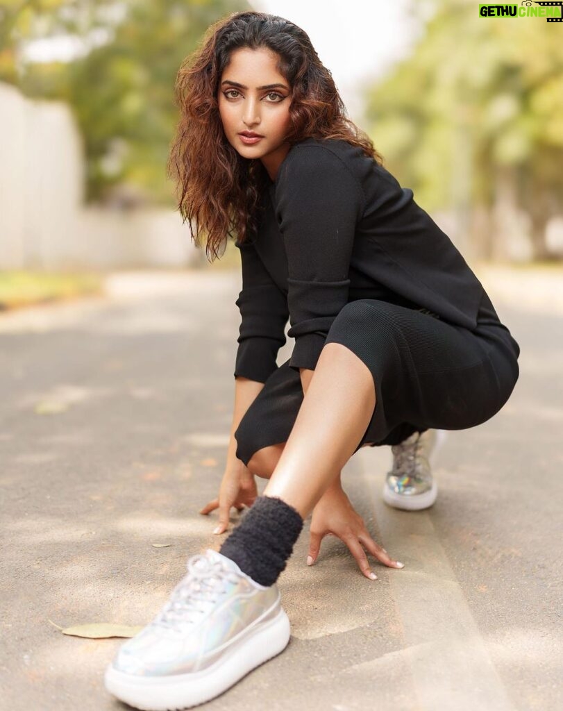 Reba Monica John Instagram - Get ready to experience the #DELECITY. This special pair features the prismatic Colors, reminiscent of the Aurora (Northern Lights) and Swarovski® crystal-adorned laces 💎 @onitsukatigerindia I mean, just look at them ✨ Clicks by @arunkummar_portraits MUH @shradhashenolikar #onitsukatigerindia #onitsukatigerofficial