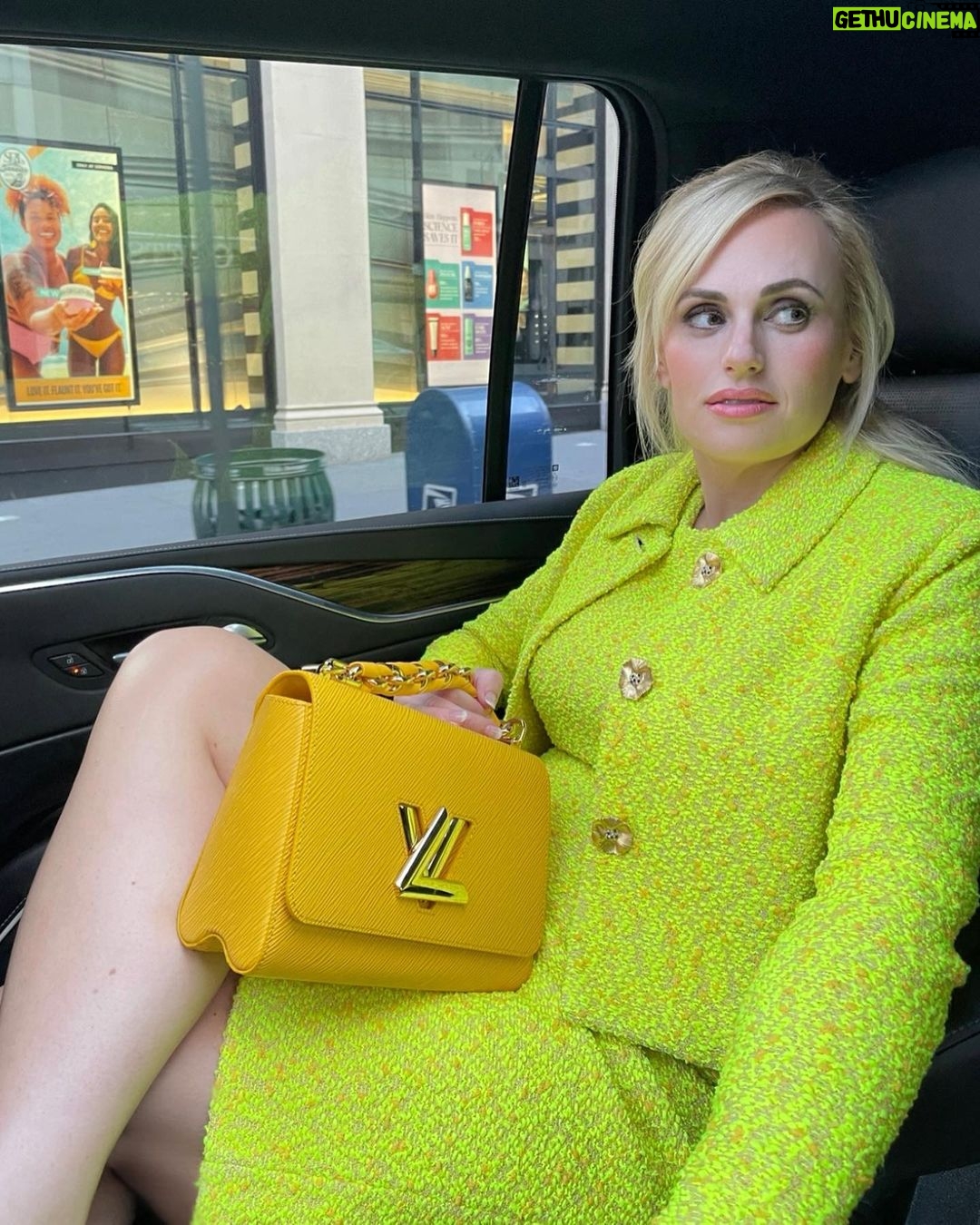Rebel Wilson Instagram - Press tour for SENIOR YEAR today in NYC 💛 Dress/coat: @stjohn Bag: @louisvuitton Hair: @djquintero MakeUp & Photo: @genevieveherr Styling: @elizabethstewart1