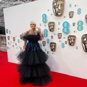 Rebel Wilson Instagram - Let’s celebrate some movies! #EE BAFTAs Dress: @giambattistavalliparis Shoes: custom @jimmychoo booties Jewelry: @bulgari Hair: @itsdash Make-Up: @karindarnell Styling: @elizabethstewart1 @styledbyjennyr (we had less than an hour to get ready after rehearsals!!)