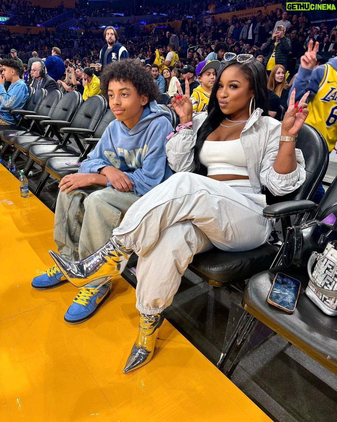 Reginae Carter Instagram - Court side Kickin’ It 🏀‼️