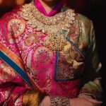 Rhea Kapoor Instagram – Since the night was dedicated to heritage ,Introducing the traditional attire of Ladakh: The Mogos, the primary garment, paired with the Bok cape for warmth, showcases the rich cultural tapestry influenced by the Silk Route. Crafted from silk by artisans of Benaras, this ensemble features intricate phoenix embroidery symbolizing energy and wisdom, with a crane motif representing peace and prosperity.

Also to carry on the theme of heritage I wore jewels from my  @kaveeta.singh @kapoor.sunita and @priya27ahuja  thank you all three for letting me raid your closets. Love you three the most. 

Outfit @namzacouture 
Bag custom @re_ceremonial
Juttis @5_elementsbyradhikagupta
Styling @rheakapoor and @manishamelwani 
Style team @sananver @junni.khyriem
Make up @makeupbyridhi
Hair  @komalvora_
photographer @josephradhik