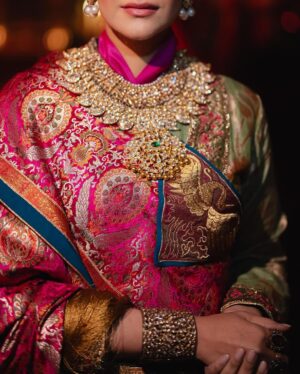 Rhea Kapoor Instagram - Since the night was dedicated to heritage ,Introducing the traditional attire of Ladakh: The Mogos, the primary garment, paired with the Bok cape for warmth, showcases the rich cultural tapestry influenced by the Silk Route. Crafted from silk by artisans of Benaras, this ensemble features intricate phoenix embroidery symbolizing energy and wisdom, with a crane motif representing peace and prosperity.

Also to carry on the theme of heritage I wore jewels from my  @kaveeta.singh @kapoor.sunita and @priya27ahuja  thank you all three for letting me raid your closets. Love you three the most. 

Outfit @namzacouture 
Bag custom @re_ceremonial
Juttis @5_elementsbyradhikagupta
Styling @rheakapoor and @manishamelwani 
Style team @sananver @junni.khyriem
Make up @makeupbyridhi
Hair  @komalvora_
photographer @josephradhik