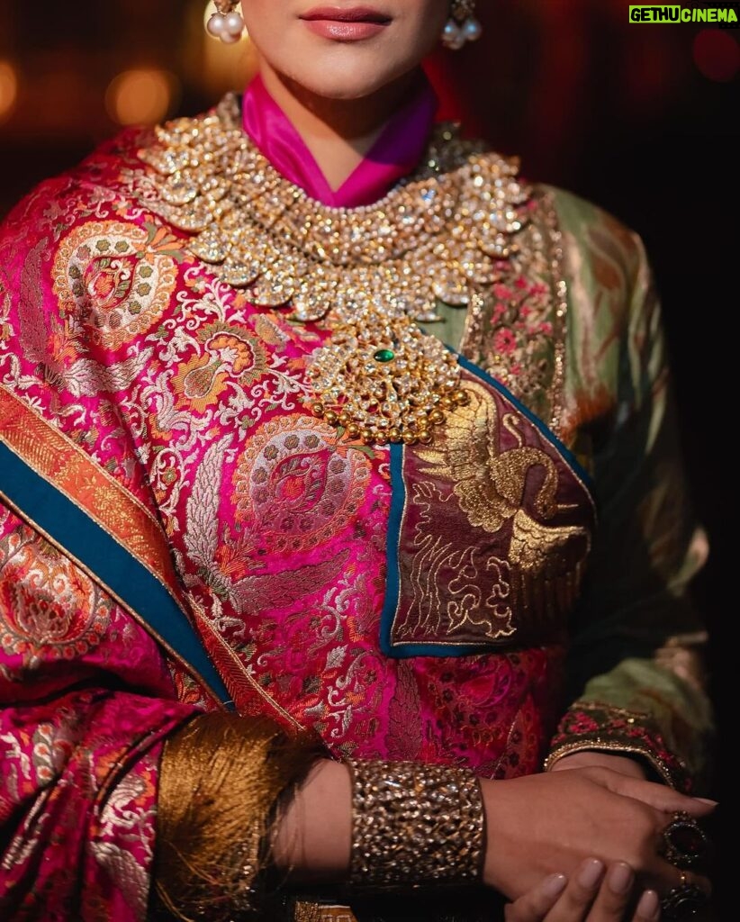 Rhea Kapoor Instagram - Since the night was dedicated to heritage ,Introducing the traditional attire of Ladakh: The Mogos, the primary garment, paired with the Bok cape for warmth, showcases the rich cultural tapestry influenced by the Silk Route. Crafted from silk by artisans of Benaras, this ensemble features intricate phoenix embroidery symbolizing energy and wisdom, with a crane motif representing peace and prosperity. Also to carry on the theme of heritage I wore jewels from my @kaveeta.singh @kapoor.sunita and @priya27ahuja thank you all three for letting me raid your closets. Love you three the most. Outfit @namzacouture Bag custom @re_ceremonial Juttis @5_elementsbyradhikagupta Styling @rheakapoor and @manishamelwani Style team @sananver @junni.khyriem Make up @makeupbyridhi Hair @komalvora_ photographer @josephradhik