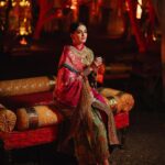 Rhea Kapoor Instagram - Since the night was dedicated to heritage ,Introducing the traditional attire of Ladakh: The Mogos, the primary garment, paired with the Bok cape for warmth, showcases the rich cultural tapestry influenced by the Silk Route. Crafted from silk by artisans of Benaras, this ensemble features intricate phoenix embroidery symbolizing energy and wisdom, with a crane motif representing peace and prosperity. Also to carry on the theme of heritage I wore jewels from my @kaveeta.singh @kapoor.sunita and @priya27ahuja thank you all three for letting me raid your closets. Love you three the most. Outfit @namzacouture Bag custom @re_ceremonial Juttis @5_elementsbyradhikagupta Styling @rheakapoor and @manishamelwani Style team @sananver @junni.khyriem Make up @makeupbyridhi Hair @komalvora_ photographer @josephradhik