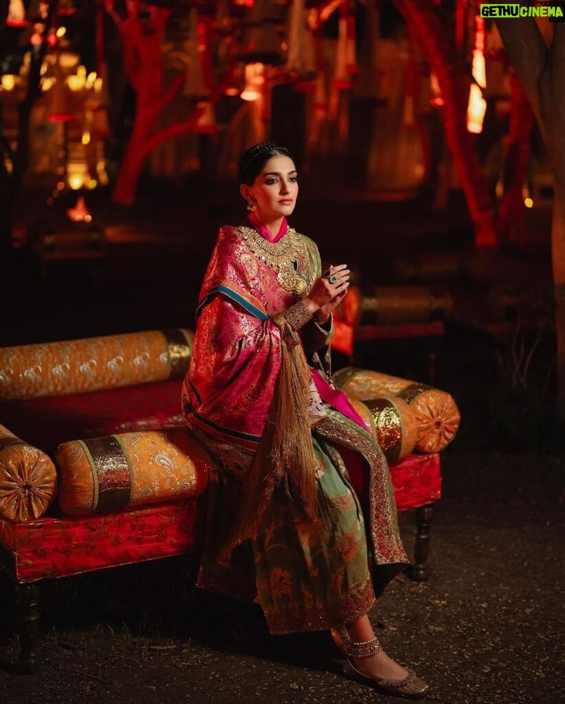 Rhea Kapoor Instagram - Since the night was dedicated to heritage ,Introducing the traditional attire of Ladakh: The Mogos, the primary garment, paired with the Bok cape for warmth, showcases the rich cultural tapestry influenced by the Silk Route. Crafted from silk by artisans of Benaras, this ensemble features intricate phoenix embroidery symbolizing energy and wisdom, with a crane motif representing peace and prosperity. Also to carry on the theme of heritage I wore jewels from my @kaveeta.singh @kapoor.sunita and @priya27ahuja thank you all three for letting me raid your closets. Love you three the most. Outfit @namzacouture Bag custom @re_ceremonial Juttis @5_elementsbyradhikagupta Styling @rheakapoor and @manishamelwani Style team @sananver @junni.khyriem Make up @makeupbyridhi Hair @komalvora_ photographer @josephradhik