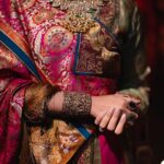 Rhea Kapoor Instagram - Since the night was dedicated to heritage ,Introducing the traditional attire of Ladakh: The Mogos, the primary garment, paired with the Bok cape for warmth, showcases the rich cultural tapestry influenced by the Silk Route. Crafted from silk by artisans of Benaras, this ensemble features intricate phoenix embroidery symbolizing energy and wisdom, with a crane motif representing peace and prosperity. Also to carry on the theme of heritage I wore jewels from my @kaveeta.singh @kapoor.sunita and @priya27ahuja thank you all three for letting me raid your closets. Love you three the most. Outfit @namzacouture Bag custom @re_ceremonial Juttis @5_elementsbyradhikagupta Styling @rheakapoor and @manishamelwani Style team @sananver @junni.khyriem Make up @makeupbyridhi Hair @komalvora_ photographer @josephradhik
