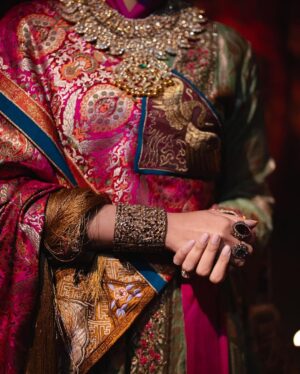 Rhea Kapoor Instagram - Since the night was dedicated to heritage ,Introducing the traditional attire of Ladakh: The Mogos, the primary garment, paired with the Bok cape for warmth, showcases the rich cultural tapestry influenced by the Silk Route. Crafted from silk by artisans of Benaras, this ensemble features intricate phoenix embroidery symbolizing energy and wisdom, with a crane motif representing peace and prosperity.

Also to carry on the theme of heritage I wore jewels from my  @kaveeta.singh @kapoor.sunita and @priya27ahuja  thank you all three for letting me raid your closets. Love you three the most. 

Outfit @namzacouture 
Bag custom @re_ceremonial
Juttis @5_elementsbyradhikagupta
Styling @rheakapoor and @manishamelwani 
Style team @sananver @junni.khyriem
Make up @makeupbyridhi
Hair  @komalvora_
photographer @josephradhik