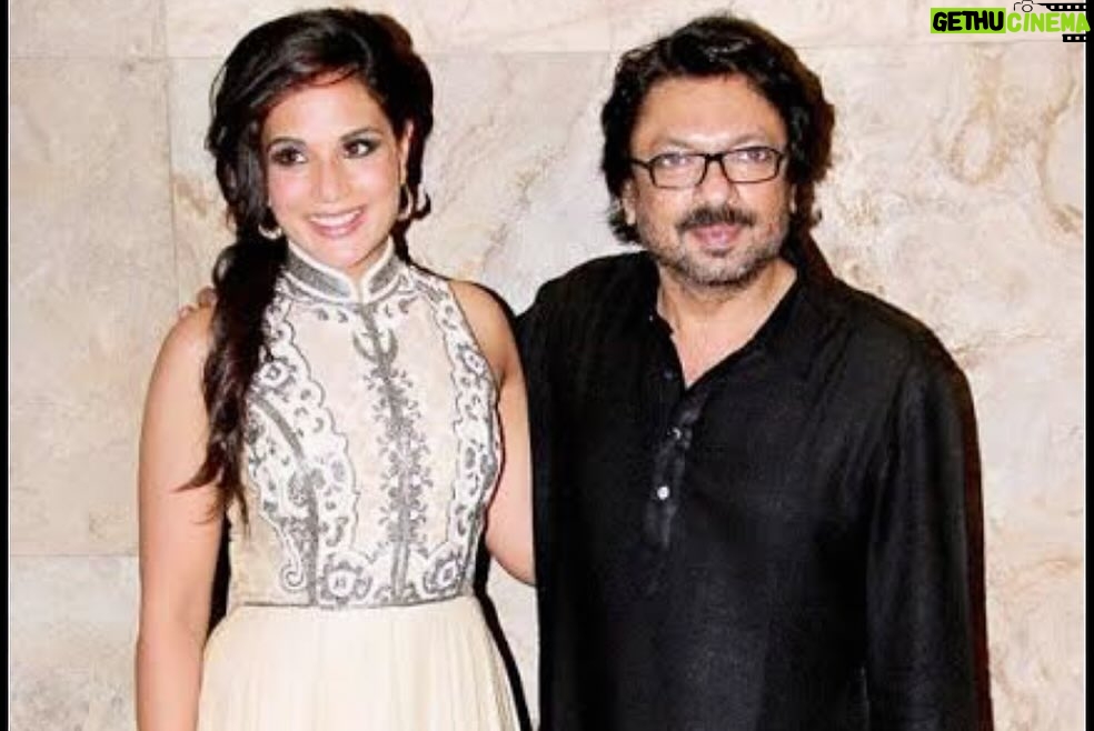 Richa Chadha Instagram - Dear Sanjay Leela Bhansali I can describe my life as an actor by dividing my career into two parts… pre-SLB and post SLB! What can I even say about you ? 🩷We know how we feel. We know the point where our ideas meet mid-air and give birth to magic… no words are uttered, the set looks on… but a gaze is exchanged and a new character is born each time, a character that will outlive both you and me… and that is your love-soaked, moist-eyed gift to the world. I love you❣️ Others want to work with you because you make them look good! Sure, no one better at it than you, every other director who tries, gets accused of having a ‘Bhansali hangover’. Your films are seminal, you’re as big as it gets and then some… but that’s not it for me! I am a greedy actor and for me, each time I work with you, I emerge a better artist. You make me do things I didn’t believe were possible! Before each shot, it’s like meeting a lover… the heart beats faster, I have butterflies in my stomach, but it’s all worth it when a character comes to life, uses my body as a medium to convey pain, lust, heartbreak and just juicy, full- bosomed love. You’re an enigma to the world, but to me you’re an old soul… preserving what’s left, documenting it for posterity, making raw emotion tug at heart strings even in this fast paced world… no one understands or respects Indian music, dance and tapestry the way you do and for that sir, I tip my hat to you! Who knows when we shall unite again, but I preserve every lesson like a gift from God! You’re my friend, my spiritual buddy, my well-wisher but most of all my Guru! I am grateful for your existence! करते हैं जिसपे तान कोई जुर्म तो नहीं, शौक़-ए-फ़िज़ूल, उल्फ़त-ए-नाकाम ही तो है ~ फ़ैज़ हैना? @bhansaliproductions 🙏🏽☺️🩷 Now and forevermore! 🩷 Your Raseela and Lajjo! #TheBest #StuffofLegend #thesanjayleelabhansali