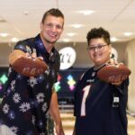 Rob Gronkowski Instagram - Had the pleasure of meeting Jake and his family the other day right at Patriot Place. Jake has been through some tough times in his life and had to miss 7th grade to receive his treatment. He is a smart, talented young kid who thinks about others. He will be honored at the @patriots game tomorrow as the third ever “Keeper of the Light” and will be ringing the Bell before the game! 🔔 He is the THIRD person to EVER do it being in the great company of the other two guys named @tombrady and @kennychesney! Thank you Jake for being an inspiration to me and others and carrying yourself the way you do! P.S. Jake, ring that bell like a GAME WINNING Gronk Spike!! @makeawishmari