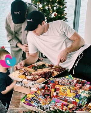 Robbie Amell Instagram - If you know anything about my wife, you know how fitting it is that we now co own a charcuterie business. 

@italiaricci and I are so excited to be a part of @cured.catering and to kick things off we are doing a $1000 Instagram giveaway! 

Here is how you enter: 
1. Follow @cured.catering +
2. Like this photo + tag a friend, who must also be following @cured.catering + 
3. The more you comment and tag the more chances you have to win! (Unlimited entries!) 
4. For an EXTRA 5 entries, repost this photo to your story! 

Also for ordering use code: Robbie — for a discount and a special gift with the first 100 orders.
