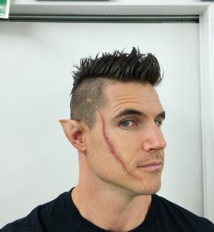 Robbie Amell Instagram - This was my hair makeup test for the Witcher… First they put a long wig on me and let me tell you, nobody wants to see that. We opted to shave a Mohawk and give a big scar. This project was so much fun to shoot and everyone, cast and crew was incredible.
Season 3 Part 1 drops in a couple days. Enjoy!!