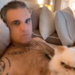 Robbie Williams Instagram – Integritas Et Cacas
So that’s the round of 32 over and the last 16 are about to take their places for success or elimination. 

it all started with ‘’Never gonna give you up’’ V ‘’Just can’t get enough’’ – Which of course Rick took by a narrow margin.

And then what followed was epic battle after epic battle. Some got through by the skin of their teeth some won by a landslide.
The early favourites by votes alone so far are. 

Wake me up before you go go -Wham 
living on a prayer – Bon Jovi 
We built this City – Starship 
You’re the voice -John Farnham 

Is your Favorite amongst the favourites?

Let’s Crack on Shall we?
Today its.

Never Gonna Give You Up – Rick Astley 

V 

Total Eclipse of the Heart – Bonnie Tyler

Come on, be part of what the internet is calling ‘’The Comment Section Cup’’

The fate of the world and its musical future lies in your hands.

Write – Never gonna give you up – or – Total Eclipse of the heart 
Below.

We take silly, Seriously.

R.P. Williams President/Chairman/Benevolent Dictator and Delusional Manifesting champ.

Namaste 🙏❤️